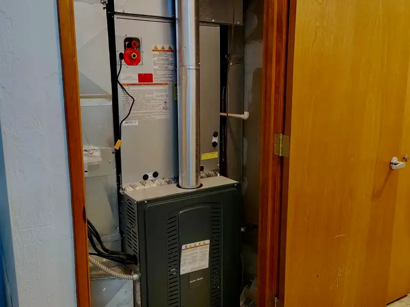 Residential heat exchanger accessed during a furnace service call